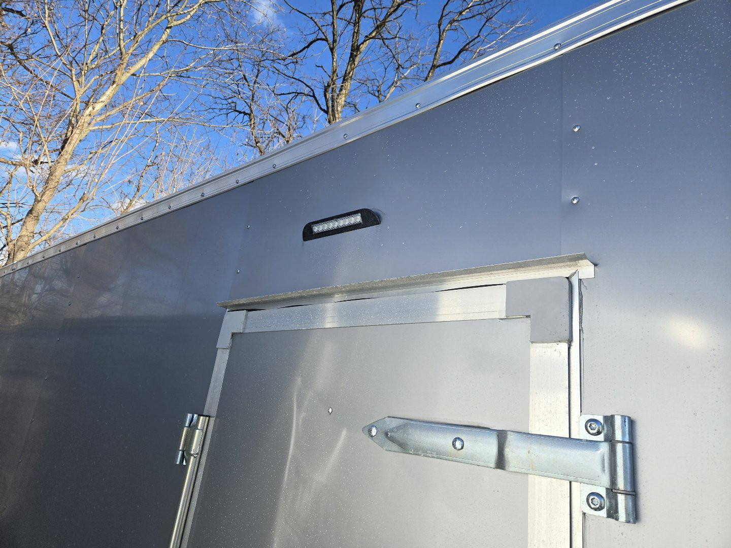 New 8.5 X 22 Homesteader Intrepid HD V-Nose Enclosed Car Trailer, 10k GVWR ****Silver w/.080 PolyCor Side Panels
