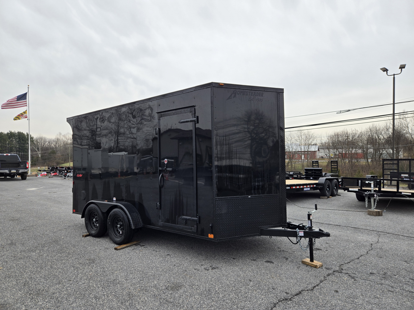 New 7 x 14 Homesteader Intrepid OHV V-Nose Cargo Trailer, 7K GVWR **Black Out Pkg, 6" Extra Height, .080 PolyCor Exterior, Ramp Door, Rear Spoiler w/ Lights