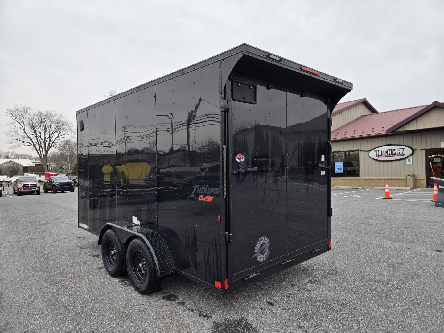 New 7 x 14 Homesteader Intrepid OHV V-Nose Cargo Trailer, 7K GVWR **Black Out Pkg, 6" Extra Height, .080 PolyCor Exterior, Ramp Door, Rear Spoiler w/ Lights