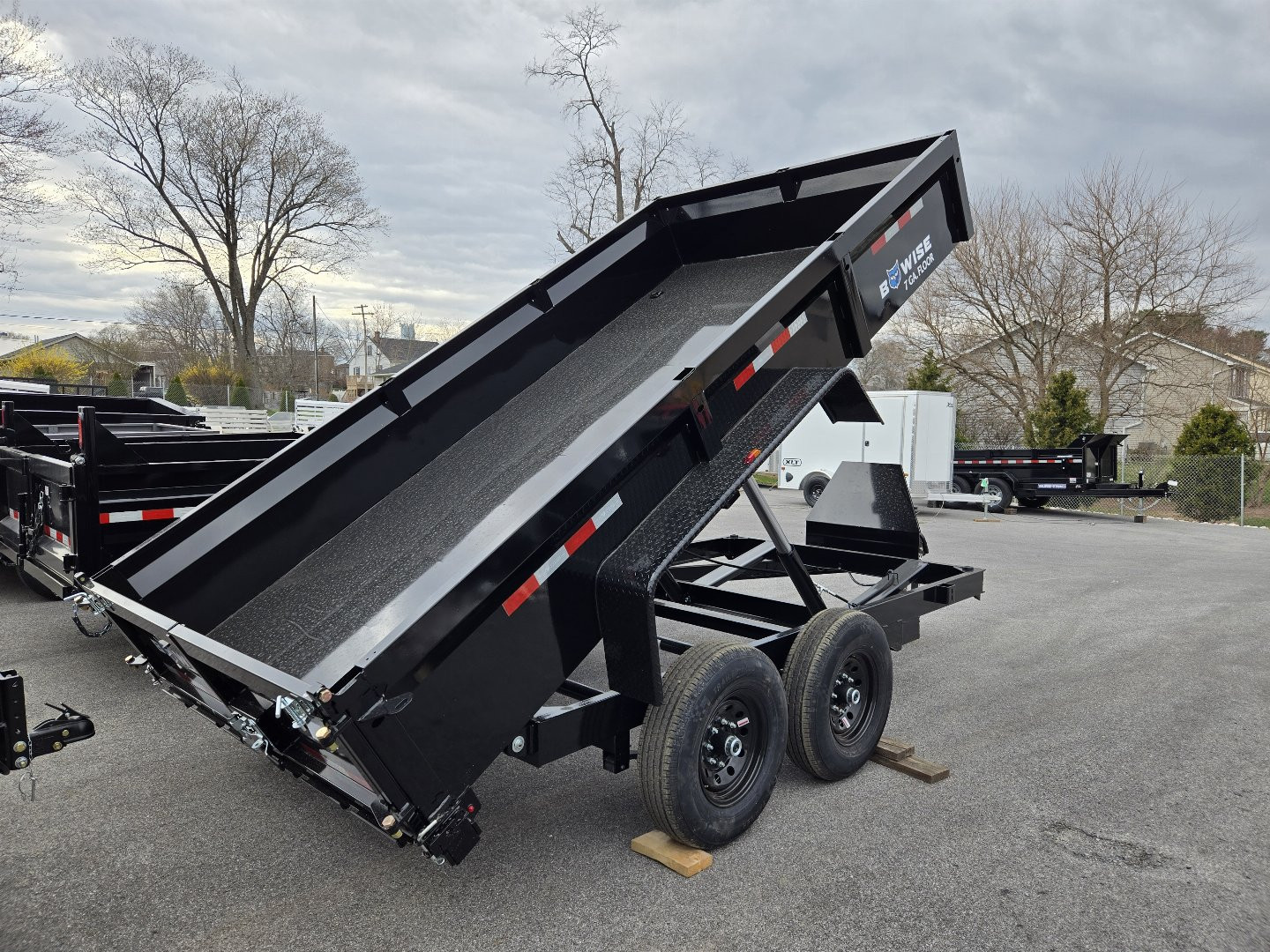 New 7 x 14 B-WISE LE Series Low Profile Dump Trailer, 14K GVWR w/Dual Telescopic Rams **7GA Floor, Dual Acting Gate, Ramps, D-Rings