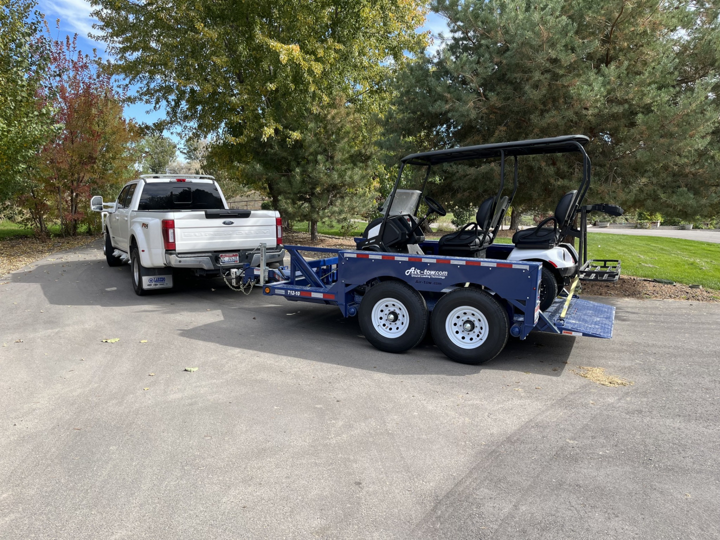 New 6'3" x 12' AIR TOW T12-10 Tandem Axle Drop Deck Equipment Trailer, 13.5k GVWR ***10,000 lb. Capacity w/Spare Mount & 110v Batt. Charger