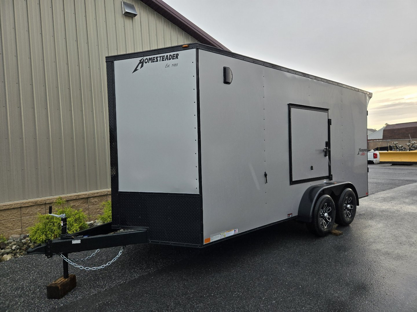 New 7 X 16 Homesteader Intrepid HD V-Nose Enclosed Cargo Trailer, 10k GVWR ***Silver PolyCor Exterior w/Black Out Pkg, Ramp Door, Alum Wheels