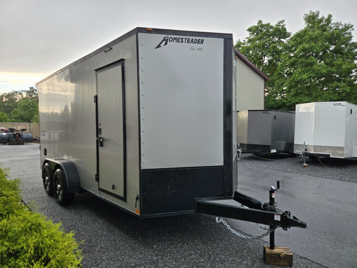 New 7 X 16 Homesteader Intrepid HD V-Nose Enclosed Cargo Trailer, 10k GVWR ***Silver PolyCor Exterior w/Black Out Pkg, Ramp Door, Alum Wheels