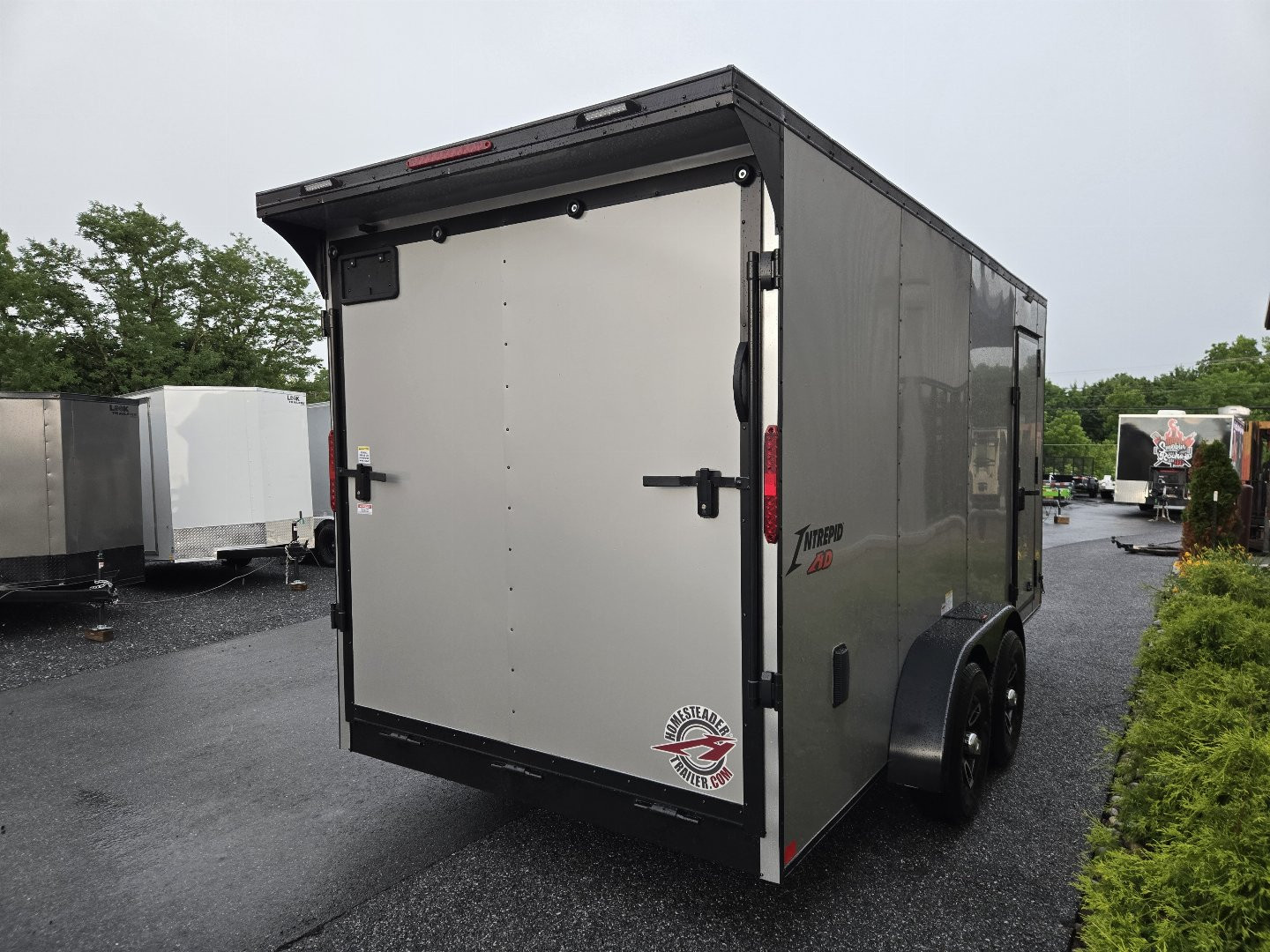 New 7 X 16 Homesteader Intrepid HD V-Nose Enclosed Cargo Trailer, 10k GVWR ***Silver PolyCor Exterior w/Black Out Pkg, Ramp Door, Alum Wheels