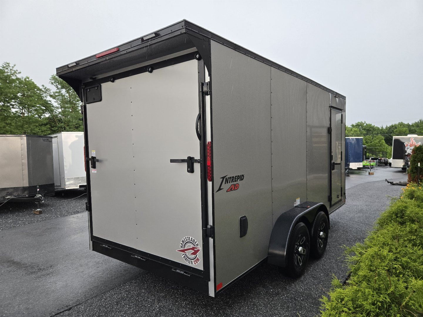New 7 X 16 Homesteader Intrepid HD V-Nose Enclosed Cargo Trailer, 10k GVWR ***Silver PolyCor Exterior w/Black Out Pkg, Ramp Door, Alum Wheels