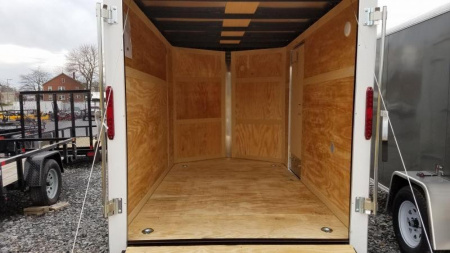 New 6 x 10 Homesteader Intrepid V-Nose Cargo Trailer, 3k GVWR **Charcoal w/ Ramp Door Package, 6" Extra Height, 16" OC Wall Posts