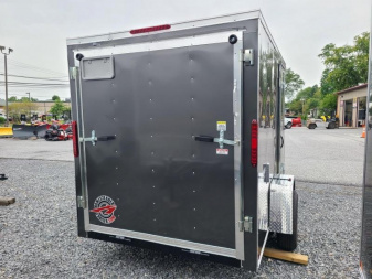 New 6 x 10 Homesteader Intrepid V-Nose Cargo Trailer, 3k GVWR **Charcoal w/ Ramp Door Package, 6" Extra Height, 16" OC Wall Posts