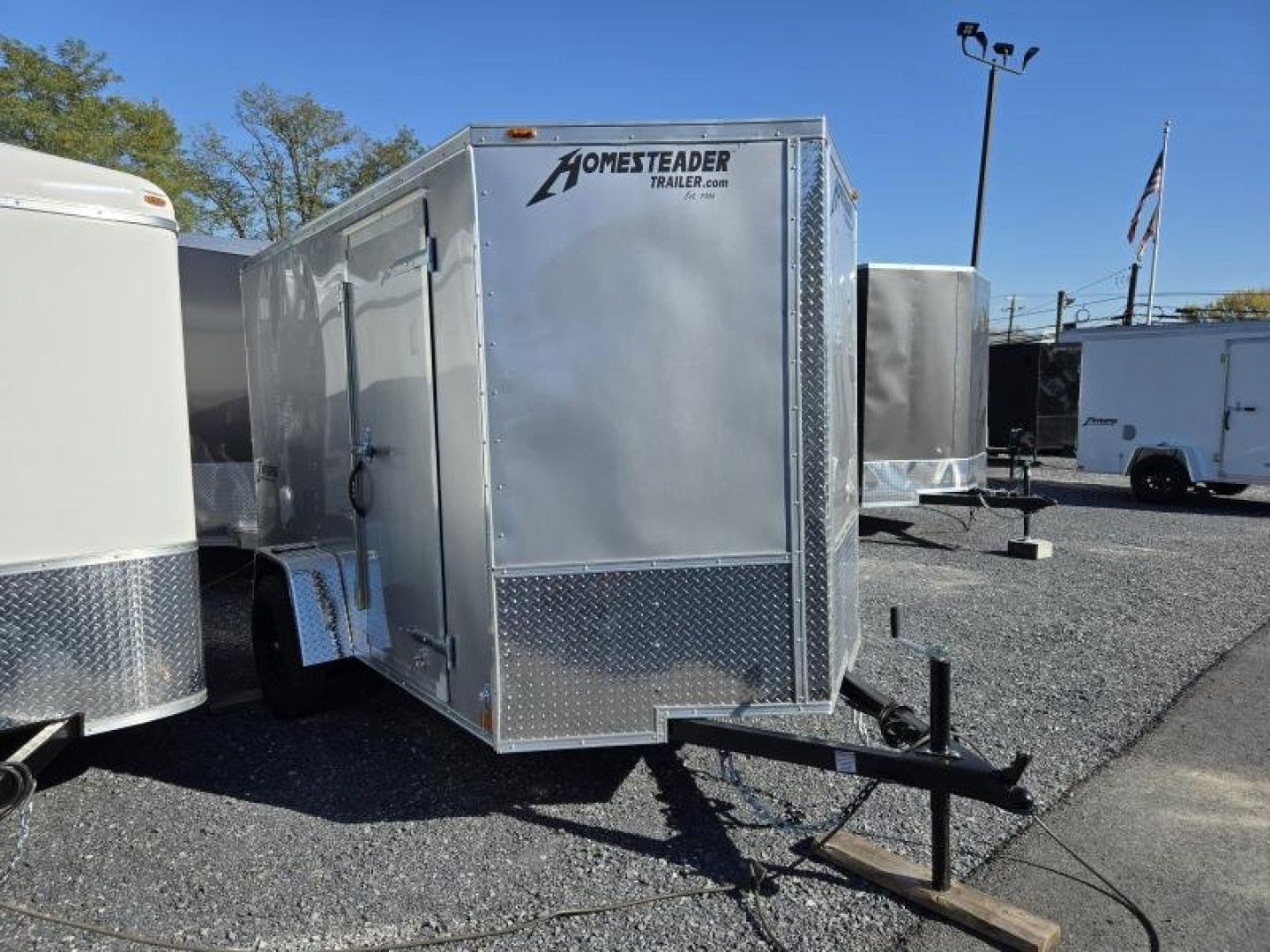 New 6 x 10 Homesteader Intrepid V-Nose Cargo Trailer, 3k GVWR **Silver w/ Ramp Door, Tie Dns