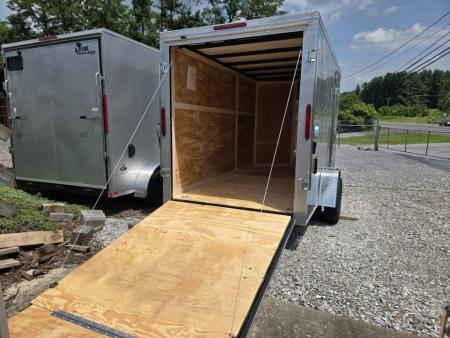 New 6 x 12 Homesteader Intrepid V-Nose Cargo Trailer, 3k GVWR **Silver Composite w/Ramp Door Pkg & 6" Extra Height