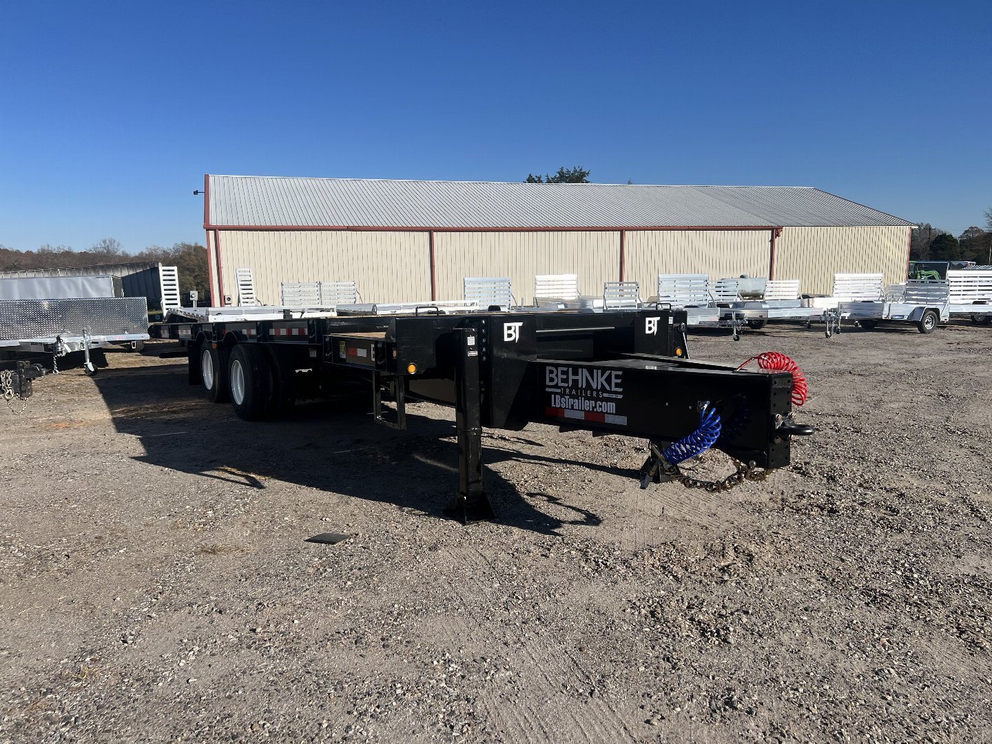 New 2025 Behnke FB8X28TPT-40L Tilt Trailer