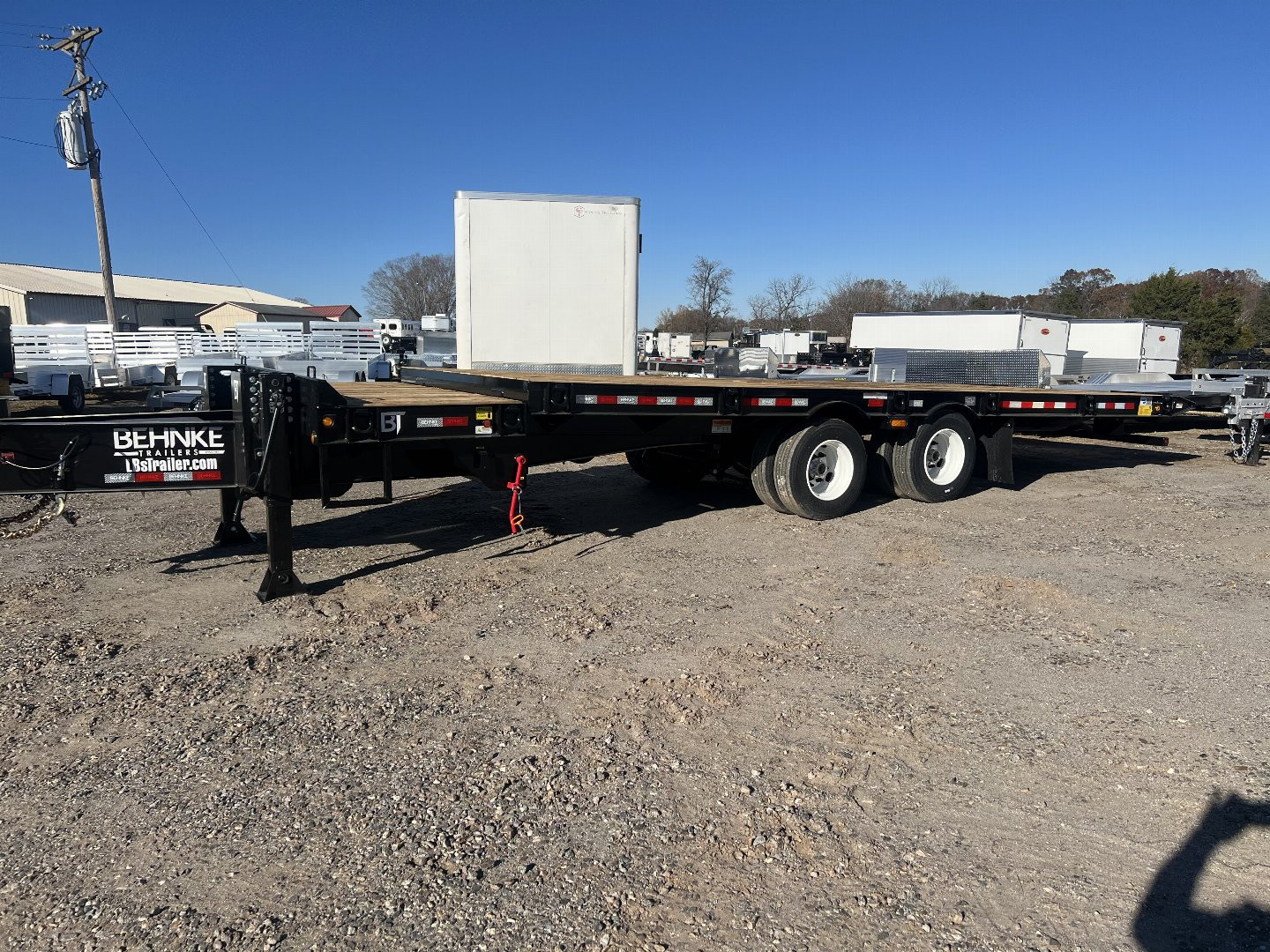 New 2025 Behnke FB8X28TPT-40L Tilt Trailer
