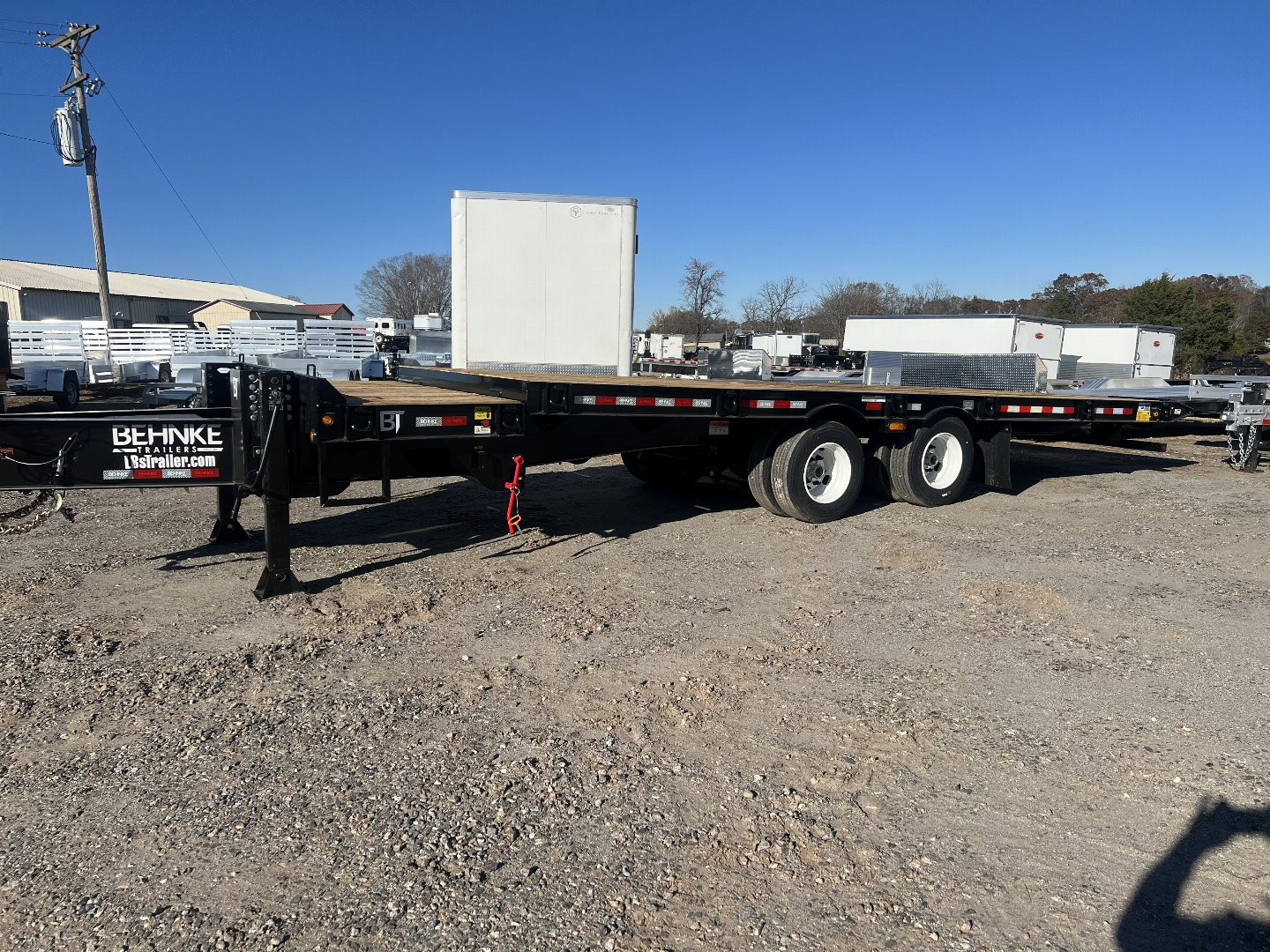New 2025 Behnke FB8X28TPT-40L Tilt Trailer