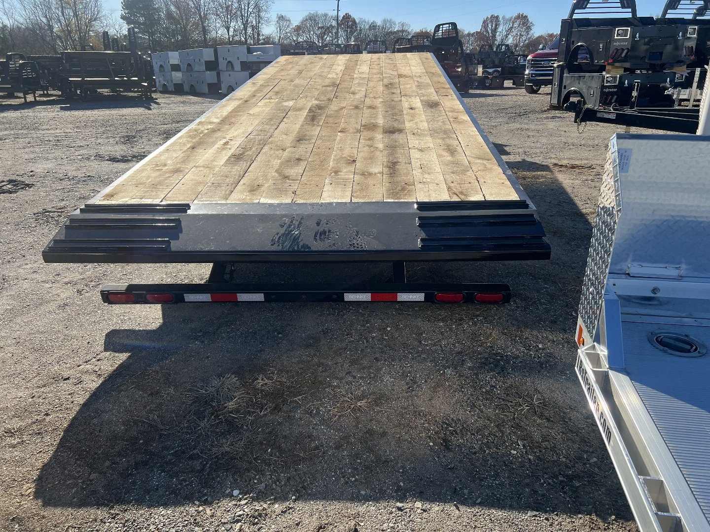 New 2025 Behnke FB8X28TPT-40L Tilt Trailer