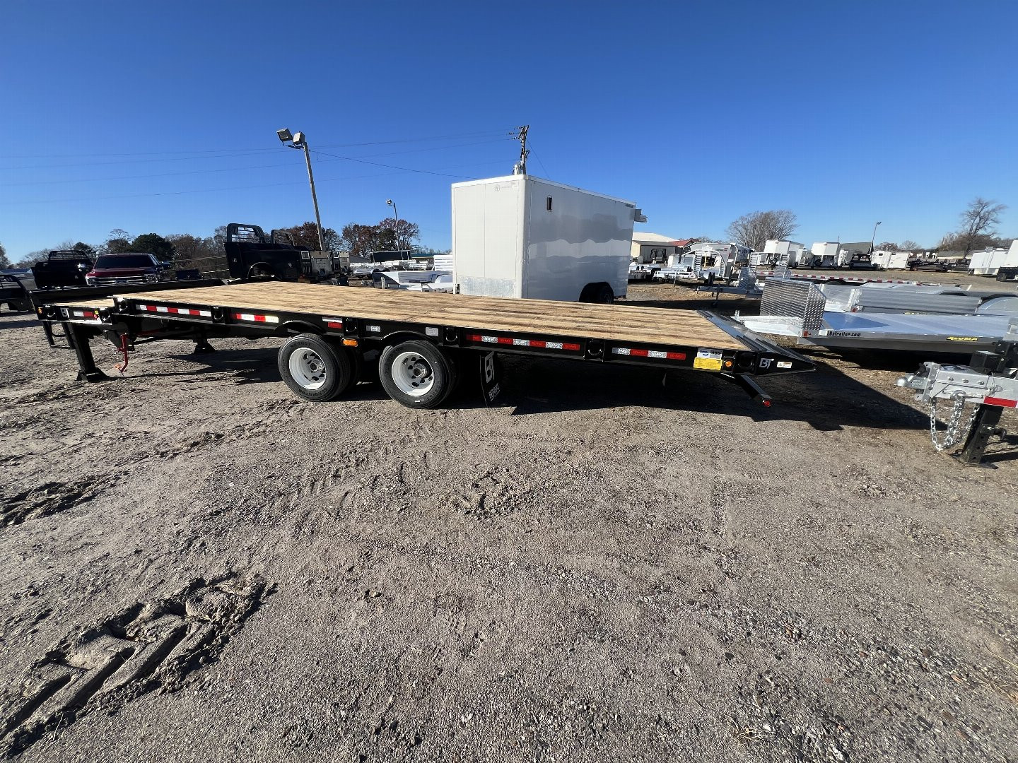 New 2025 Behnke FB8X28TPT-40L Tilt Trailer