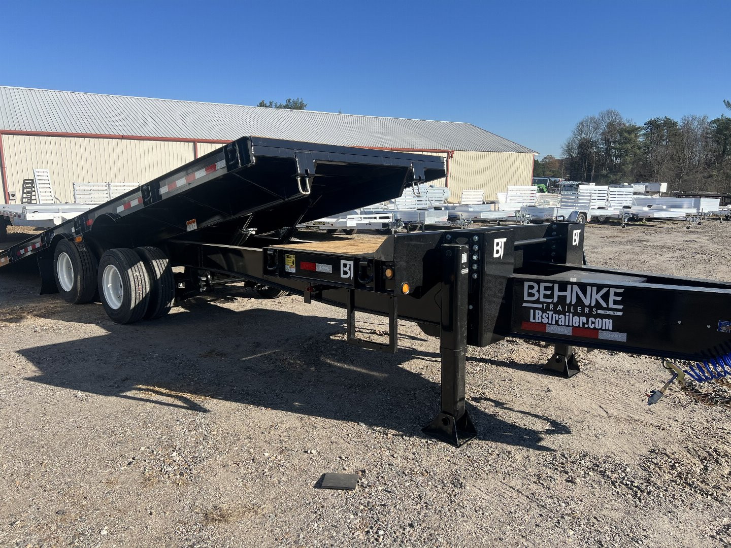 New 2025 Behnke FB8X28TPT-40L Tilt Trailer