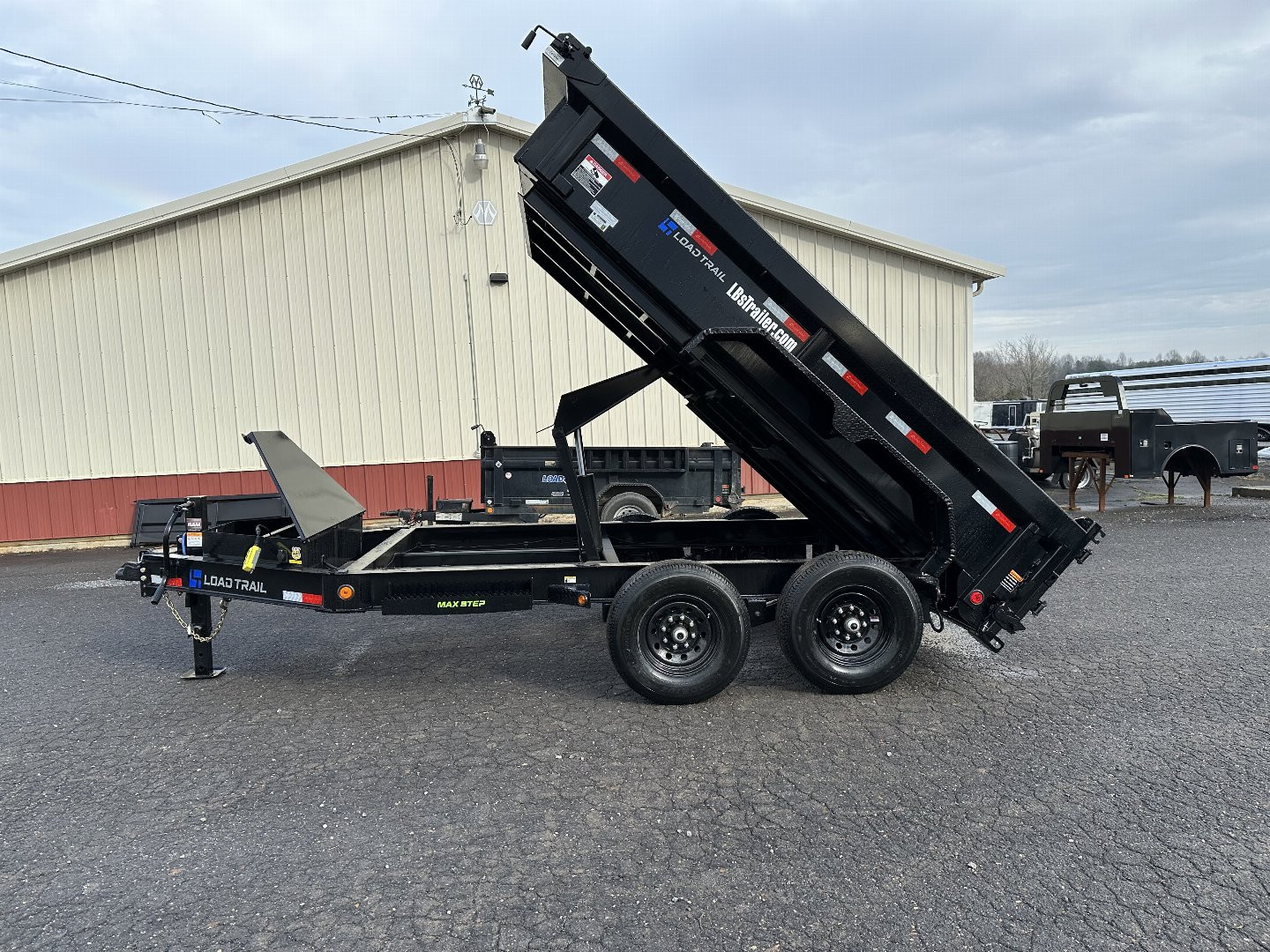 New 2025 Load Trail 83" x 12' Tandem Axle Low-Pro Dump