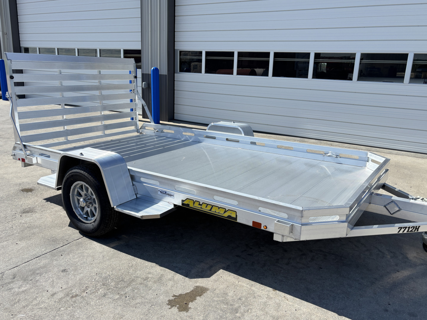 New 2026 Aluma 7712HS-TG Utility Trailer