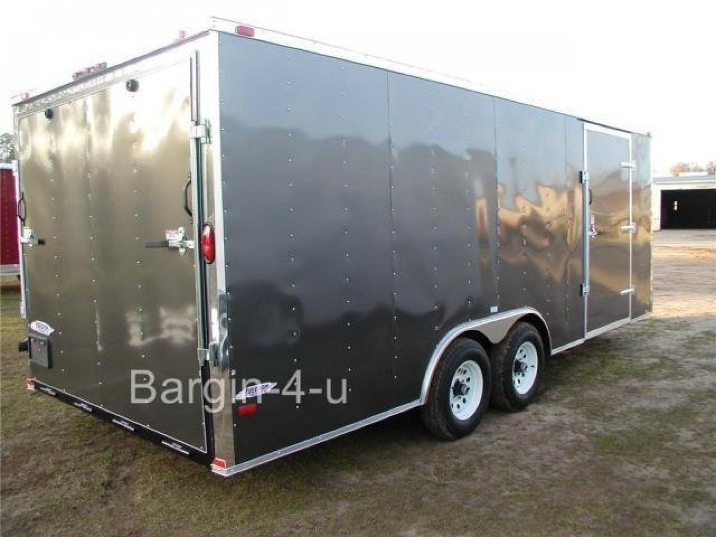 New 2026 Brand New 8.5 x 20 Tandem Axle, V-Nosed Enclosed Carhauler Trailer