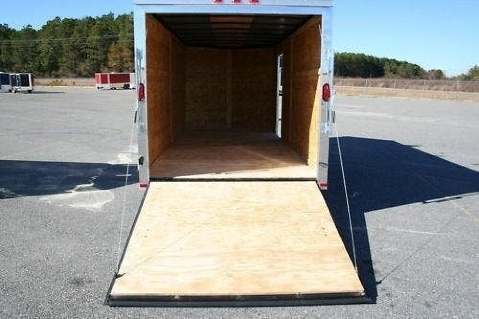 New 2026 NEW 7 x 16 V-NOSE ENCLOSED CARGO MOTORCYCLE TRAILER - TOURING PACKAGE