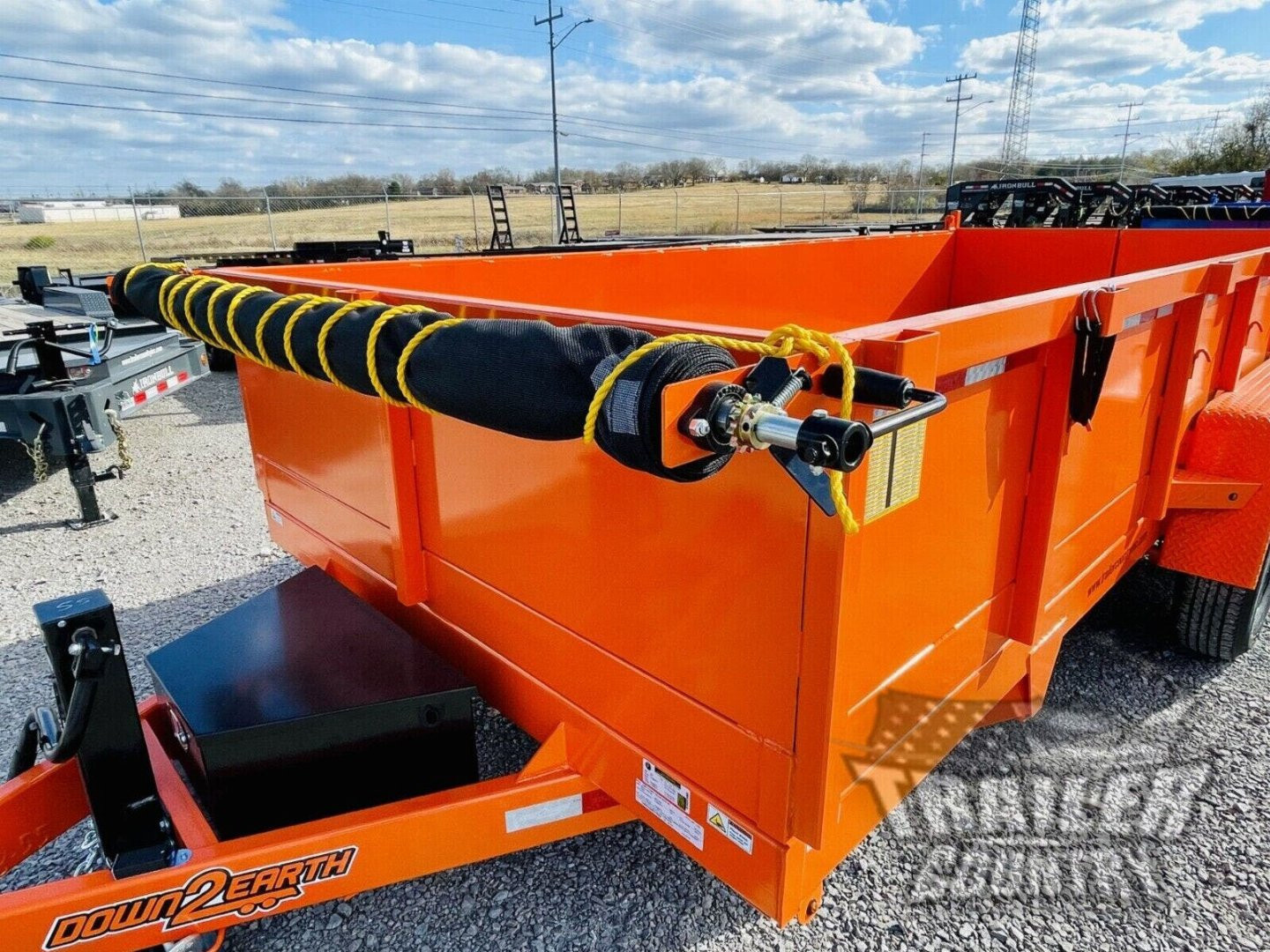 New 2026 New 7' x 16'  Hydraulic Dump Trailer w/ 24" High Sides, 1 Piece Floor, Remote, Power Up & Down, and MORE!
