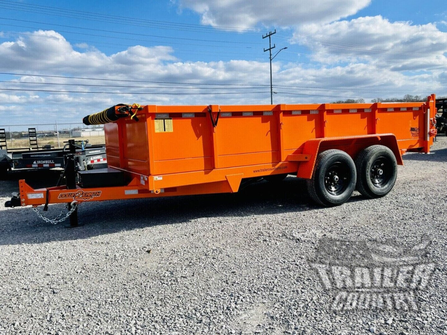 New 2026 New 7' x 16'  Hydraulic Dump Trailer w/ 24" High Sides, 1 Piece Floor, Remote, Power Up & Down, and MORE!