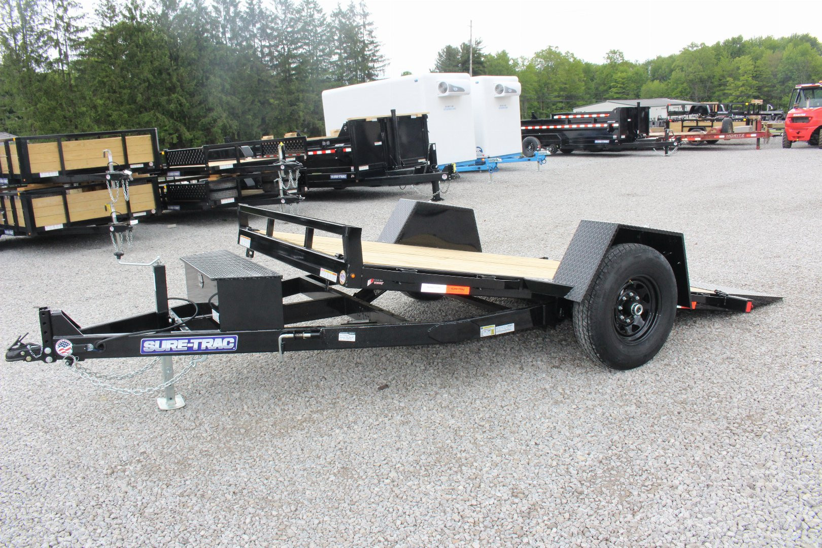 New 2025 Sure-Trac 6' 6" x 12' Gravity Tilt Equipment Trailer - 7800# GVW