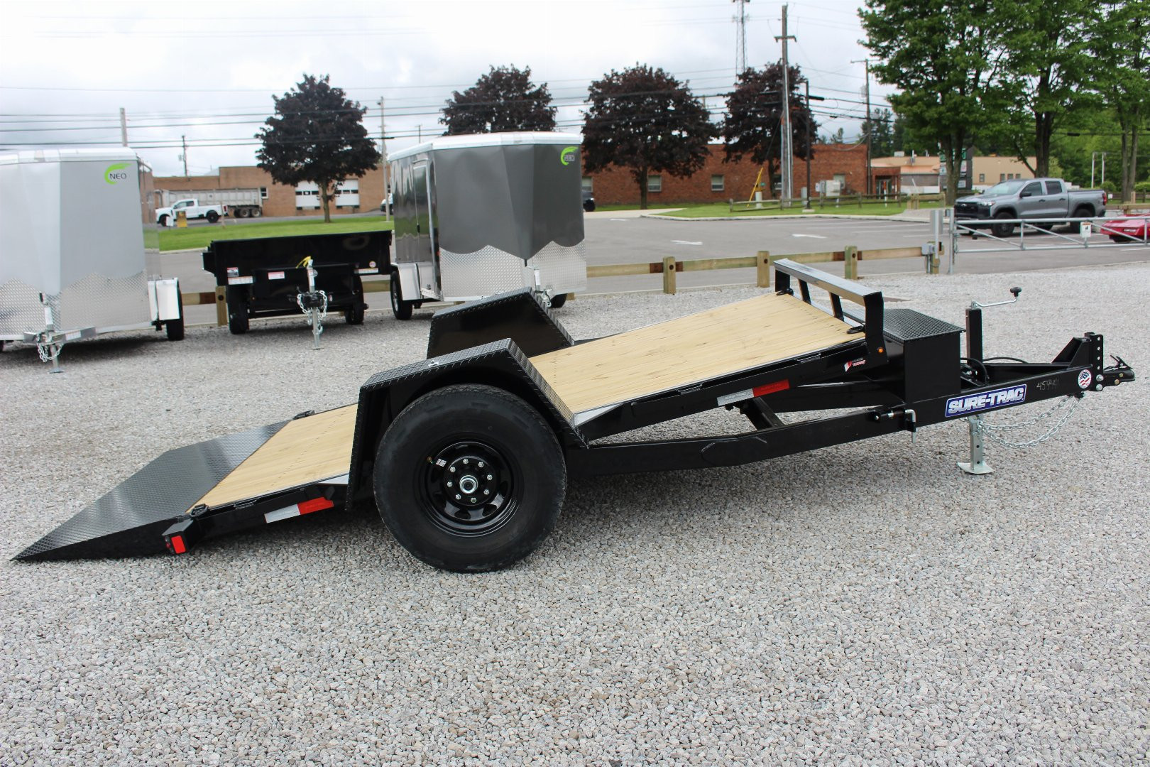 New 2025 Sure-Trac 6' 6" x 12' Gravity Tilt Equipment Trailer - 7800# GVW