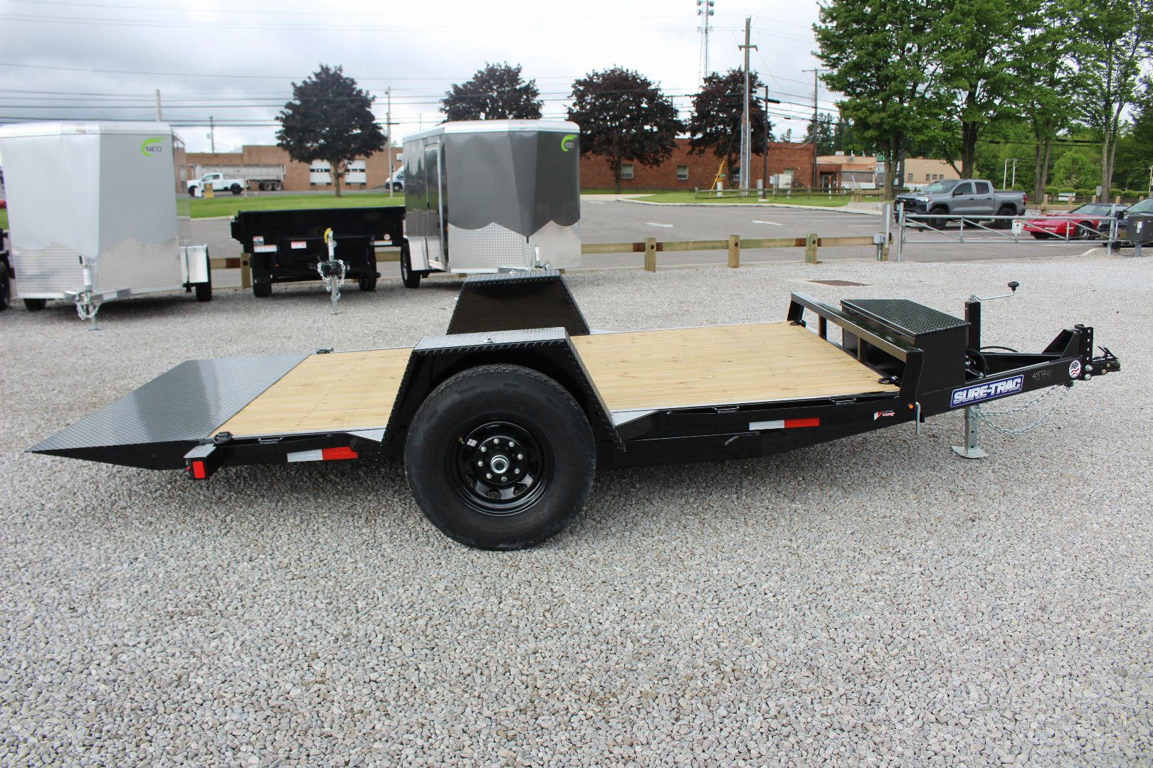 New 2025 Sure-Trac 6' 6" x 12' Gravity Tilt Equipment Trailer - 7800# GVW