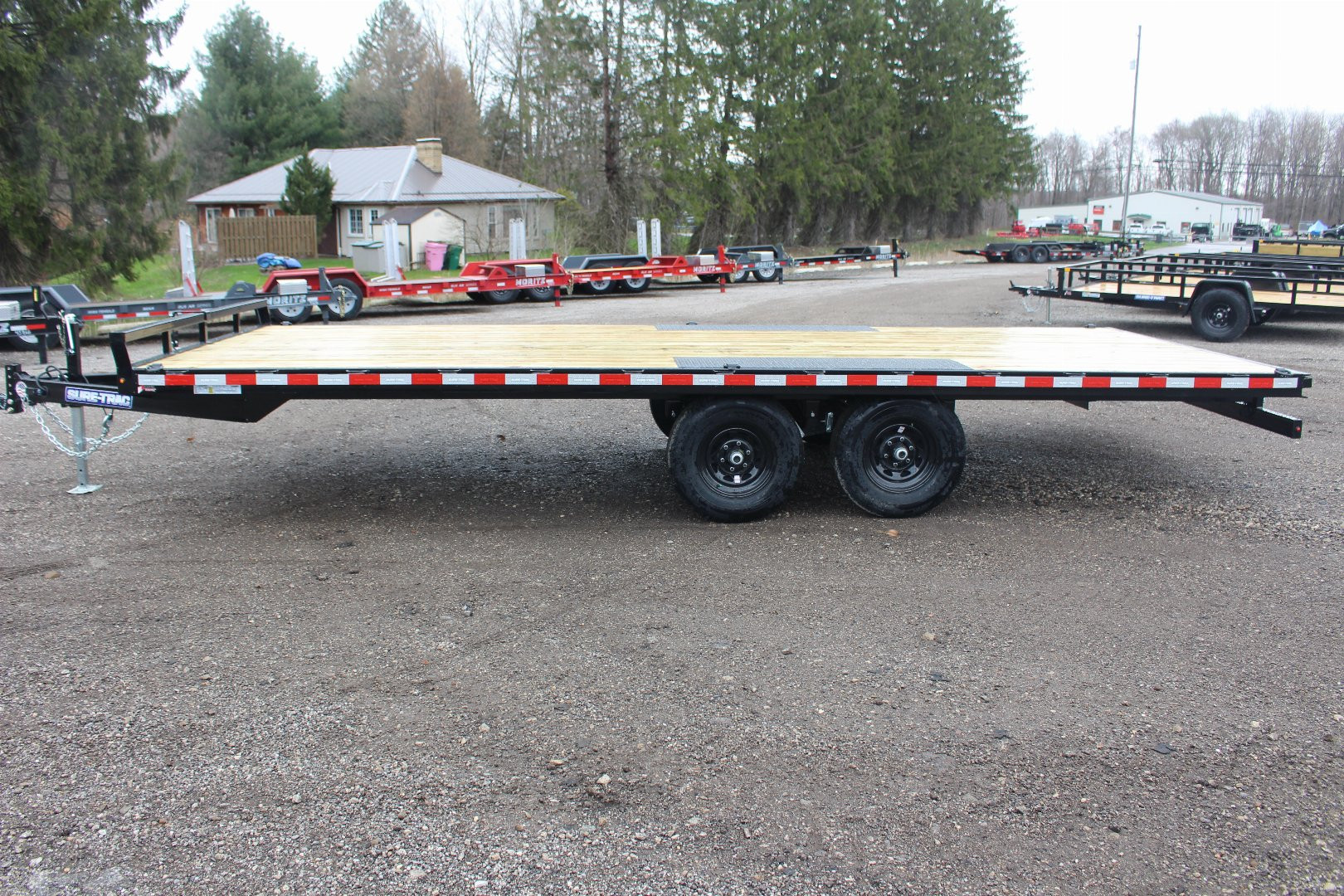 New 2025 Sure-Trac 8.5' x 20' Low Profile Deckover Flatbed Trailer With Steel Ramps - 9900# GVW