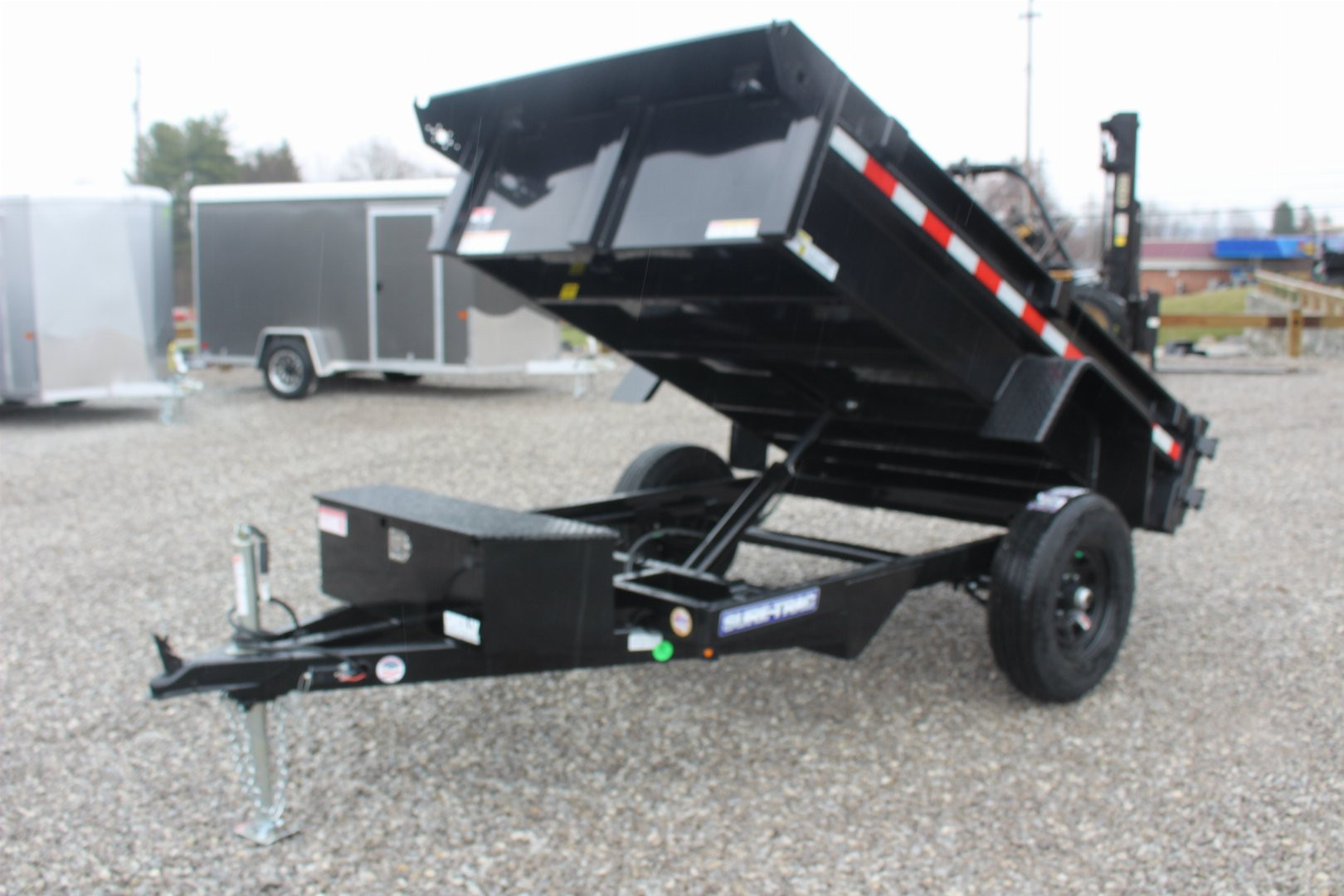 New 2025 Sure-Trac 5' x 8' Low Profile Homeowner Dump Trailer 5K - Single Ram (NO RAMPS) - BARN DOORS