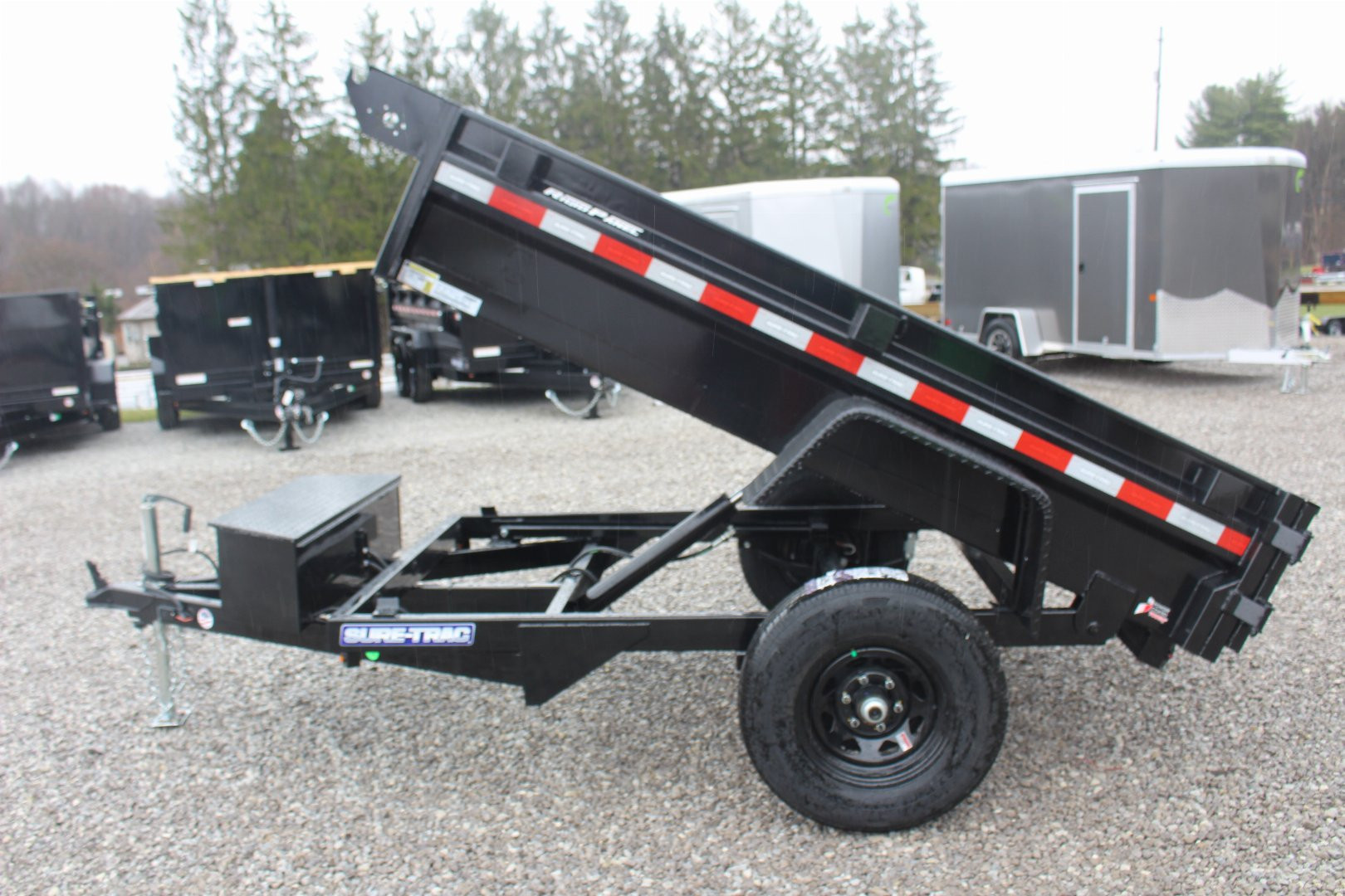 New 2025 Sure-Trac 5' x 8' Low Profile Homeowner Dump Trailer 5K - Single Ram (NO RAMPS) - BARN DOORS