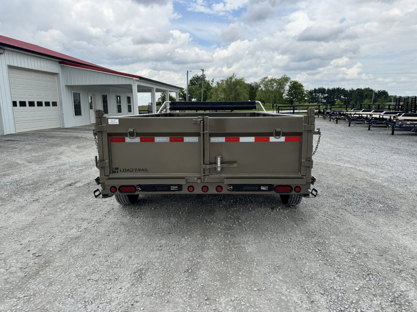New 2025 Load Trail 83"x14' 14,000# Scissor Lift Dump Trailer