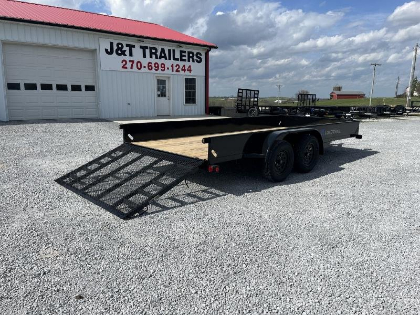 New 2025 Load Trail 83"x16' Tandem Utility Trailer w/Solid Sides
