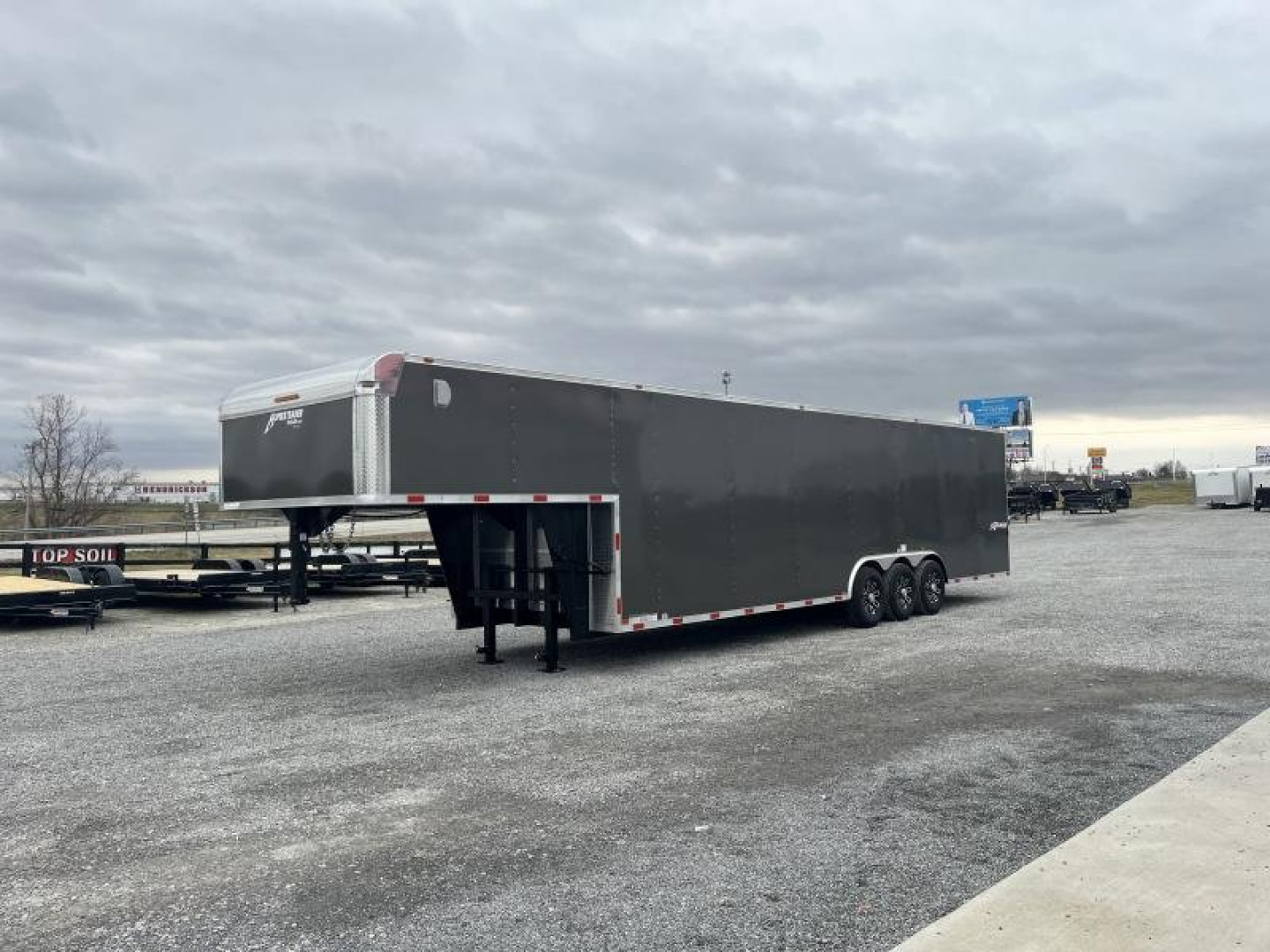 New 2025 Homesteader 8.5'x38' Champion Tri-Axle Gooseneck