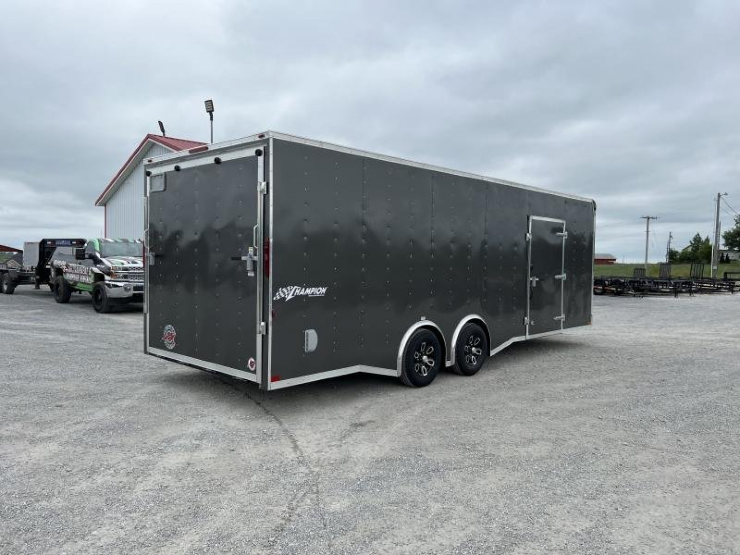 New 2025 Homesteader 8.5'x24' Champion Spread Axle Enclosed Race Trailer