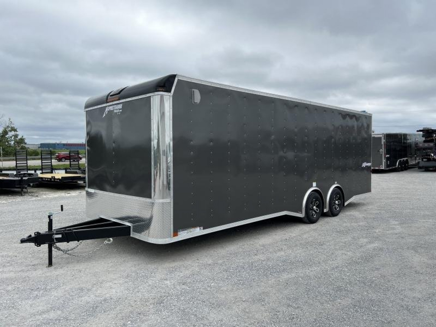 New 2025 Homesteader 8.5'x24' Champion Spread Axle Enclosed Race Trailer