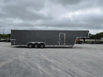 New 2024 Homesteader 8.5'x38' Champion Tri-Axle Gooseneck Enclosed Trailer