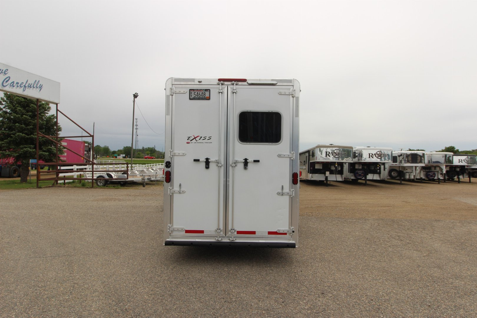 Used 2015 Exiss Trailers 4HR 10' LQ Slide Horse Trailer