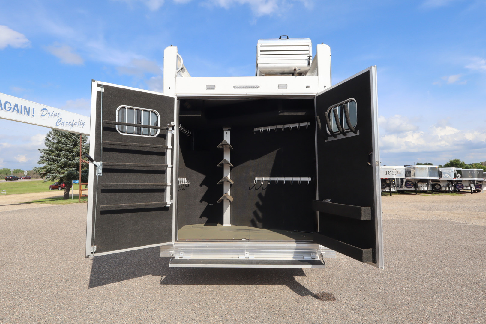 New 2025 Bloomer 4HR PC Side Ld LQ w/ Mid-Tack Horse Trailer