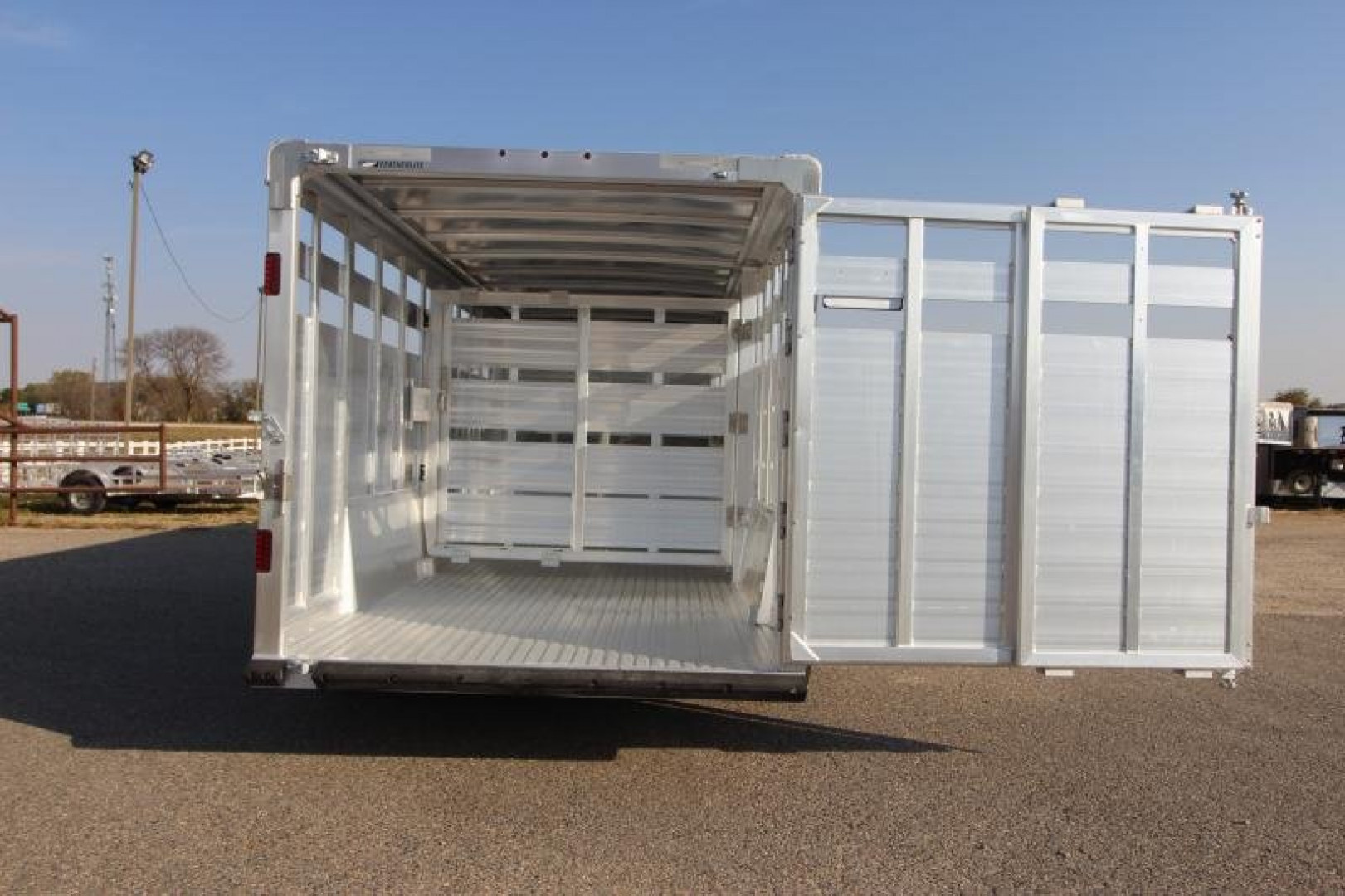 New 2025 Featherlite 8127 24' GN Stock / Stock Combo Trailer