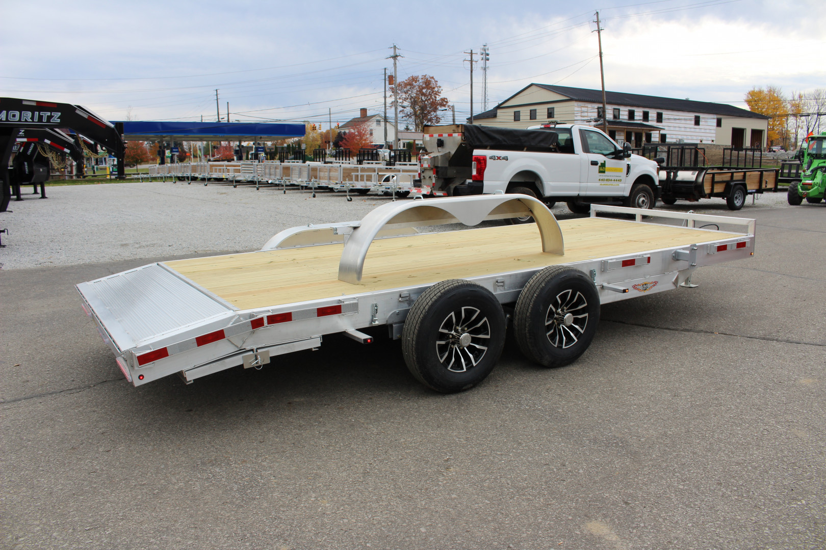 New 2025 H & H Trailer 7' x 18' Heavy Duty Aluminum Car Hauler - Slide In Ramps - 9900# GVW
