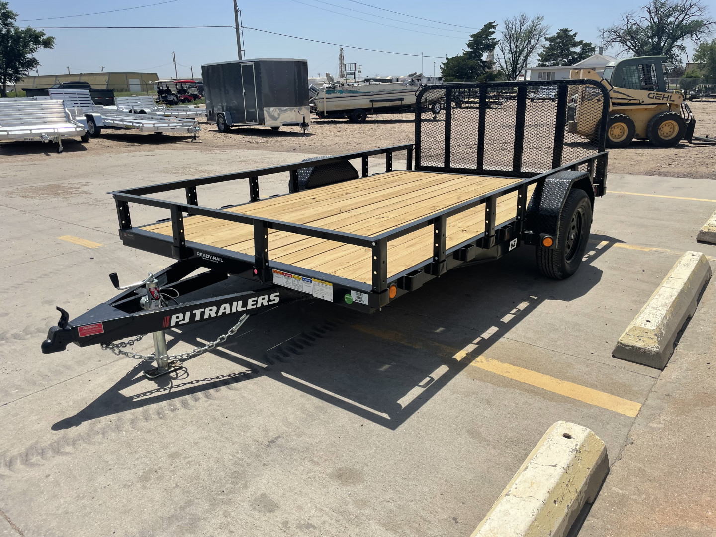 New 2025 PJ Trailers 83" x 12' U8121 Utility Trailer