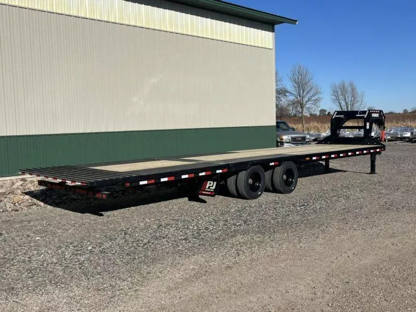 New 2026 34' 25.9k PJ Low-Pro with Hydraulic Dove Trailer