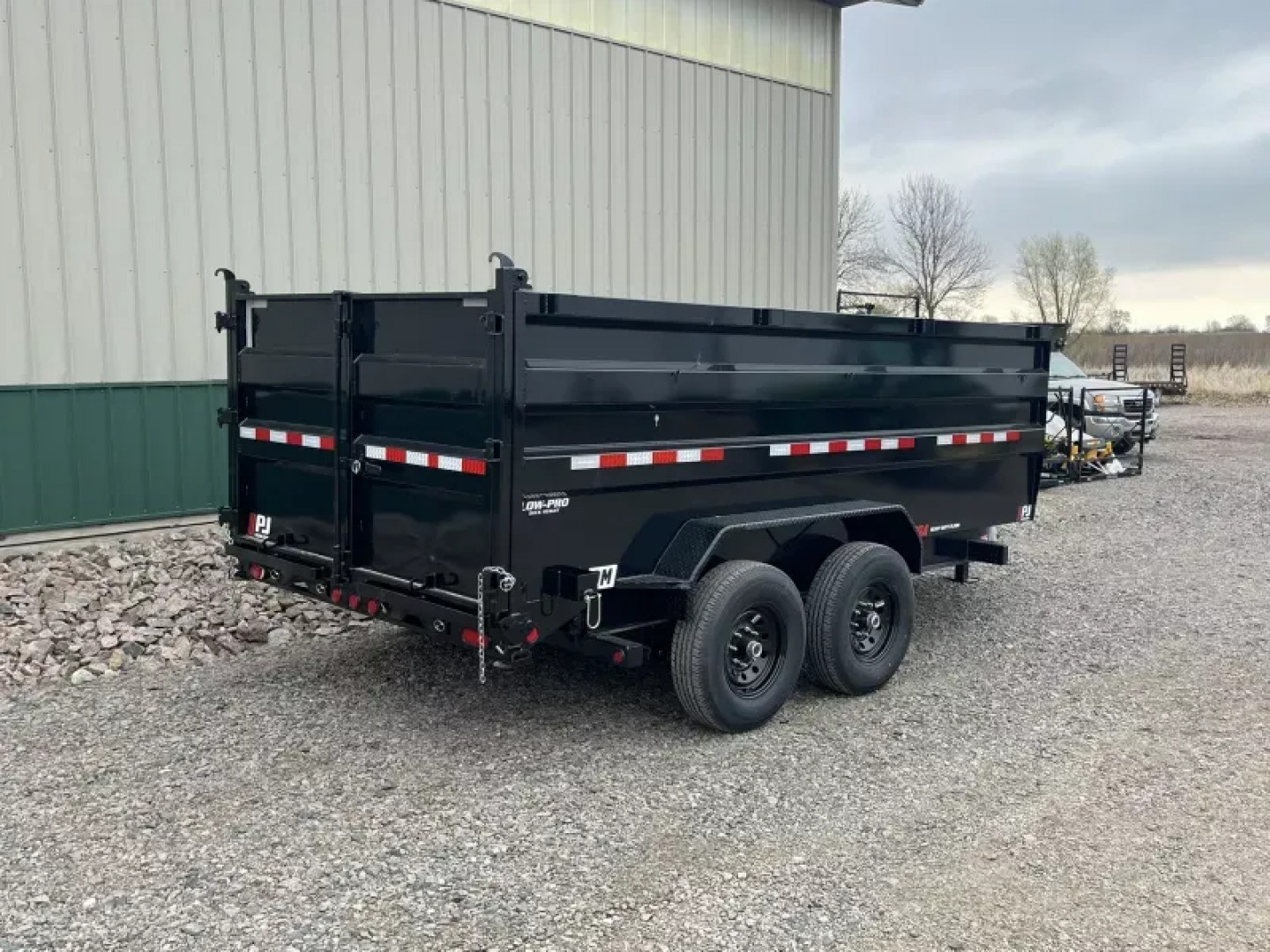 New 2025 PJ 14'x83" Low Pro High Side Dump Trailer