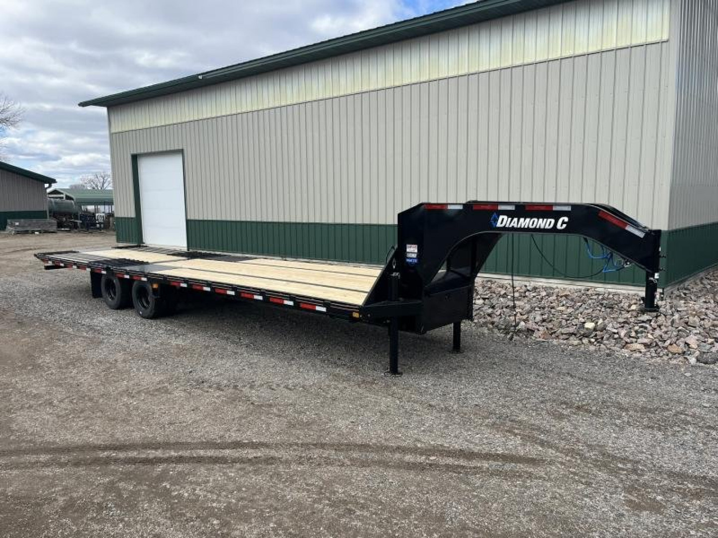 New 2025 Diamond C Trailers FMAX210 32' Hydraulic Dovetail GN Flatbed Trailer