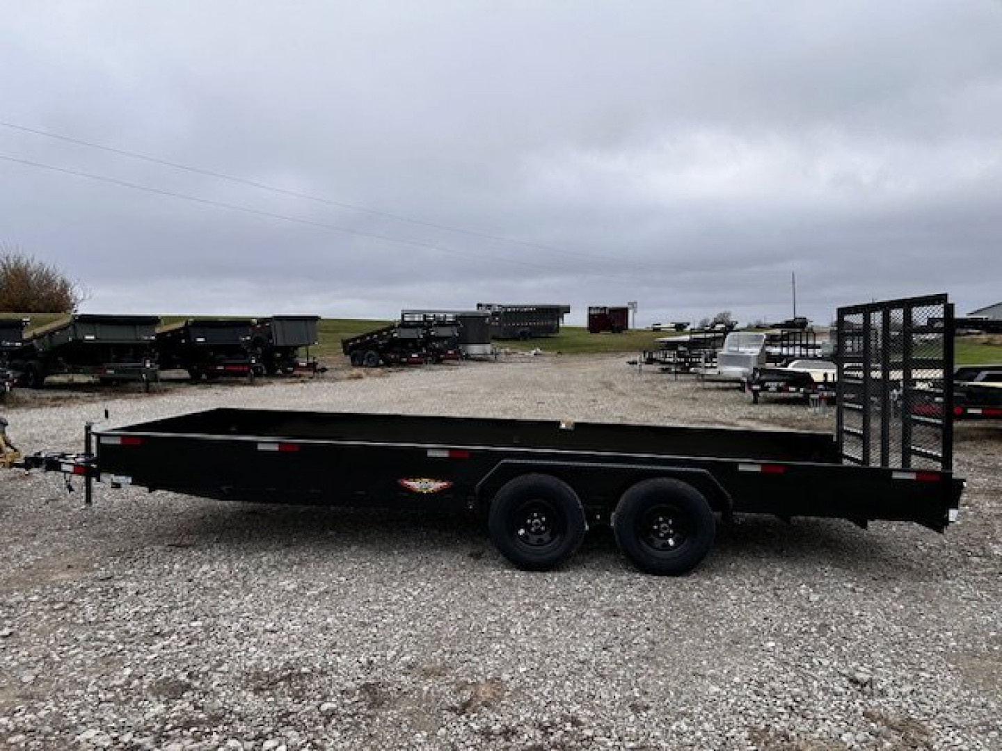 New 2025 H&H Trailers NEW 82"X20' SOLID SIDE 7K GVWR 5' LADDER STYLE GATE Utility Trailer