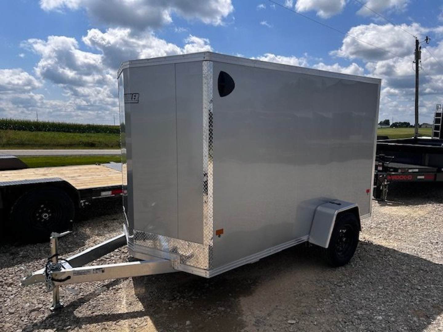 New 2025 E-Z Hauler 6X10 XLT Cargo / Enclosed Trailer REAR RAMP DOOR