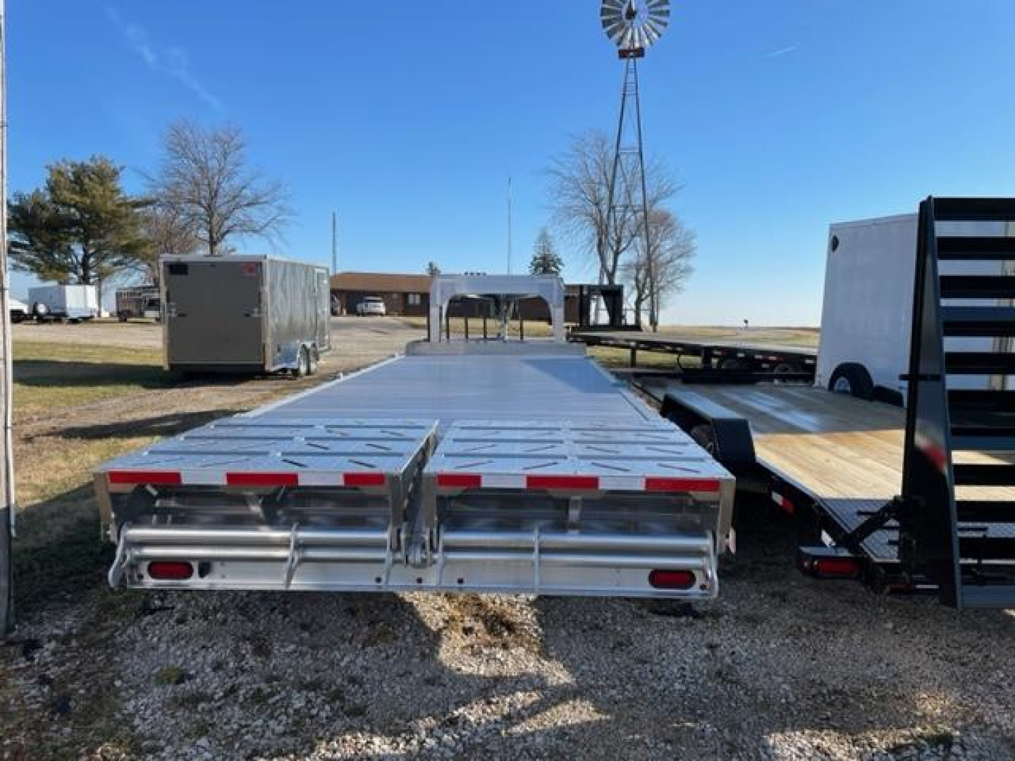 New 2025 EBY Deckover Equipment Trailer