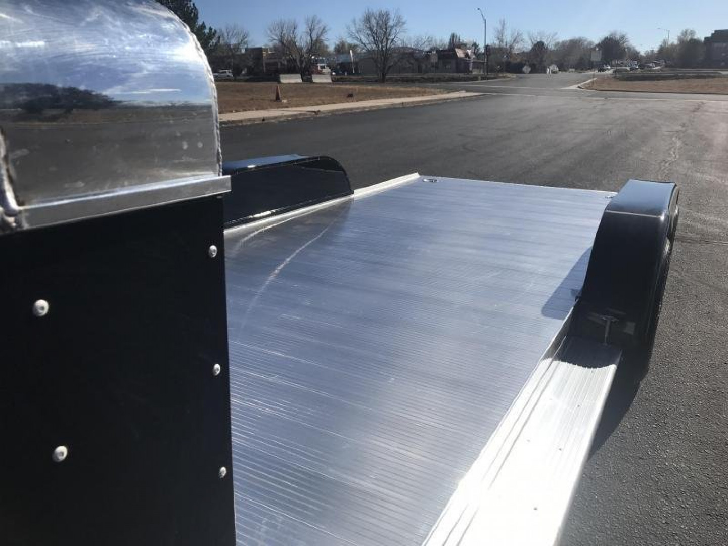 New 2023 Sundowner Car Hauler with Rock Guard