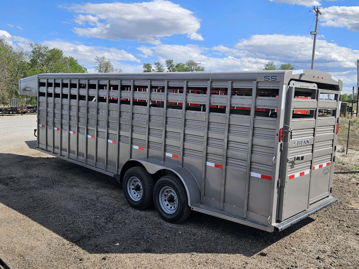 New 2024 TITAN TRAILER 6'8 x 24' Stock Trailer